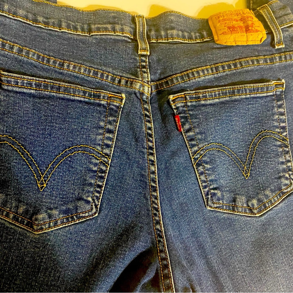 Levi’s 550. Relaxed boot cut. Size 12. Medium wash.